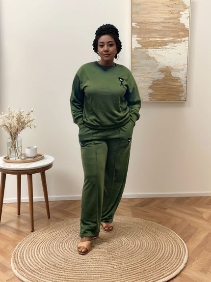 Army-green loose-fit jogger set with matching sweatshirt and joggers, cat logo embroidery