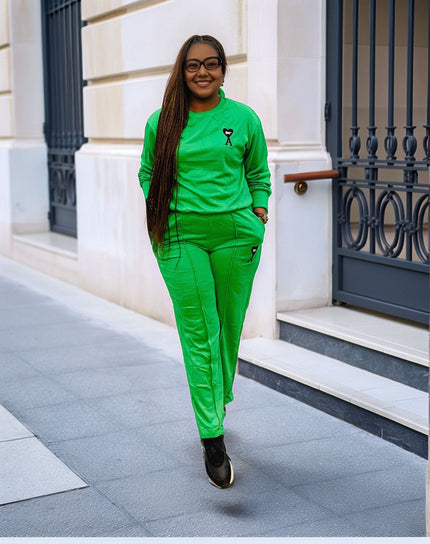 Emerald-green loose-fit jogger set with crewneck sweatshirt and tapered jogger legs