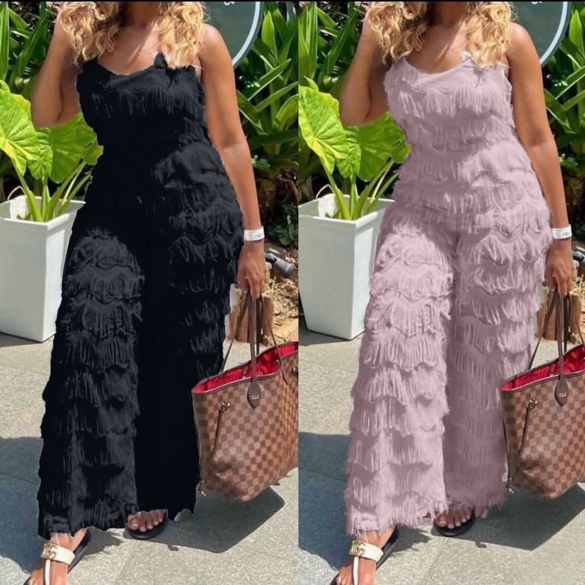 Black and light-pink textured belted jumpsuit with fringe detail, sleeveless