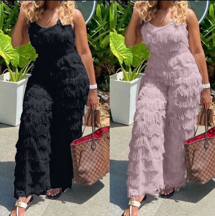 Black and light-pink textured belted jumpsuit with fringe detail, sleeveless