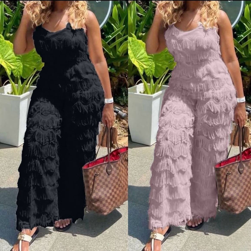 Black and light-pink textured belted jumpsuit with fringe detail, sleeveless