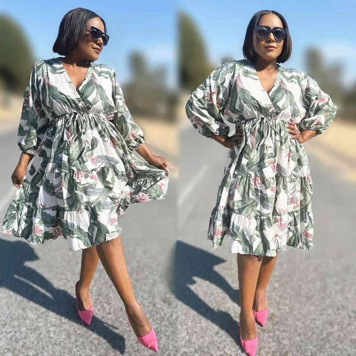 Printed midi dress with puff sleeves, green floral pattern, gathered waist