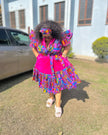Multicolor printed midi dress with ruffled puff sleeves and tiered skirt, pink bodice