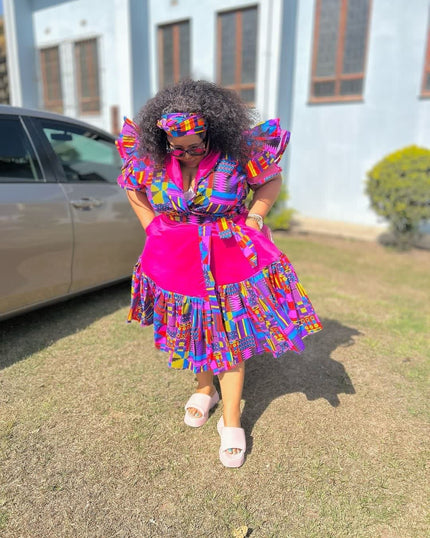 Multicolor printed midi dress with ruffled puff sleeves and tiered skirt, pink bodice
