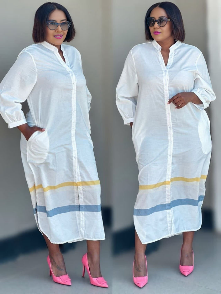 White midi dress with mandarin collar, button front, and yellow-blue striped hem