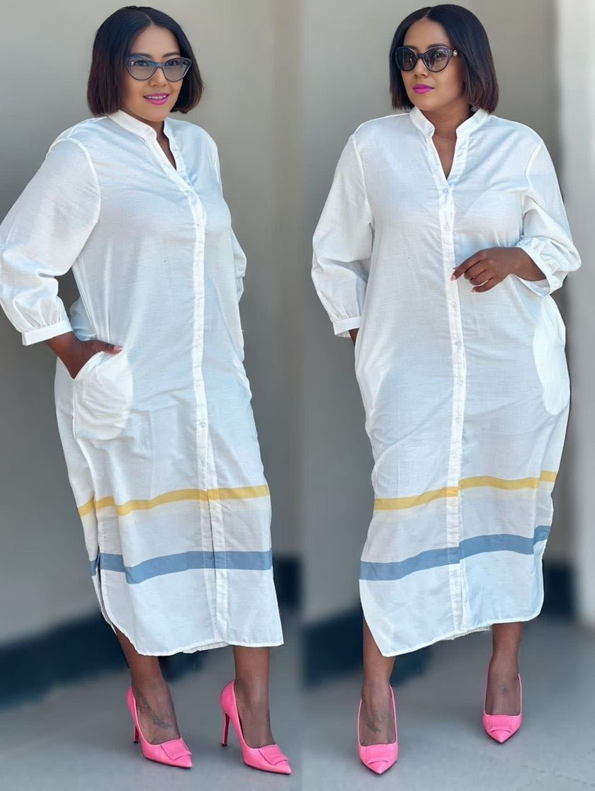 White midi dress with mandarin collar, button front, and yellow-blue striped hem