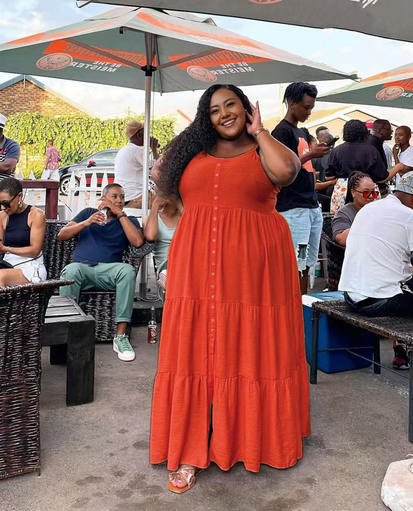 Orange-red plus size maxi dress with tiered ruffle layers, scoop neck, short sleeves