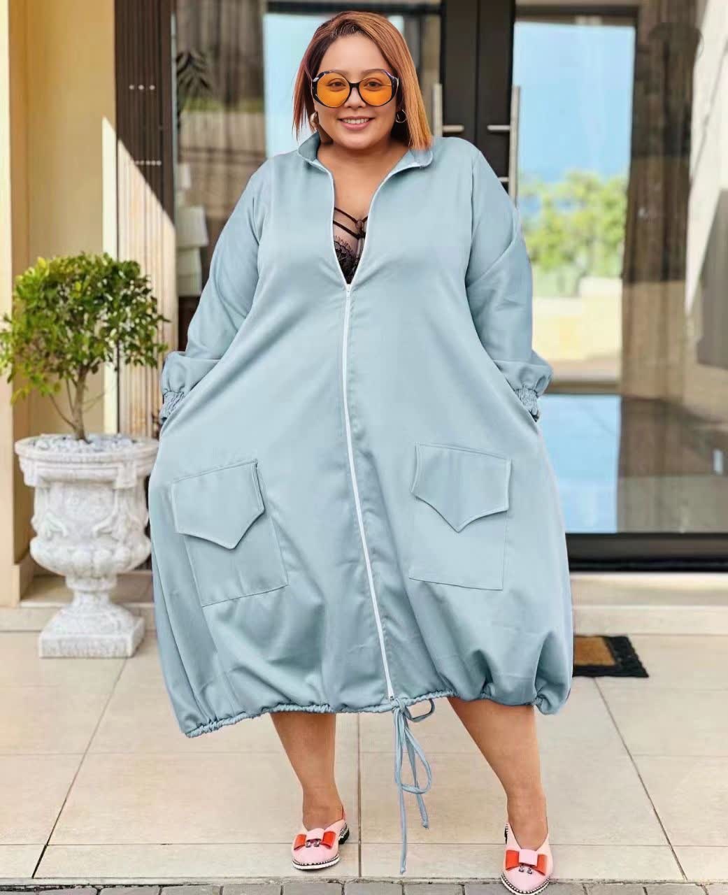 Sky-blue puff sleeve midi dress with front zipper, patch pockets, drawstring hem