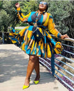 Geometric Pattern Patchwork Long Sleeve Dress with Cinched Waist and Layered Skirt