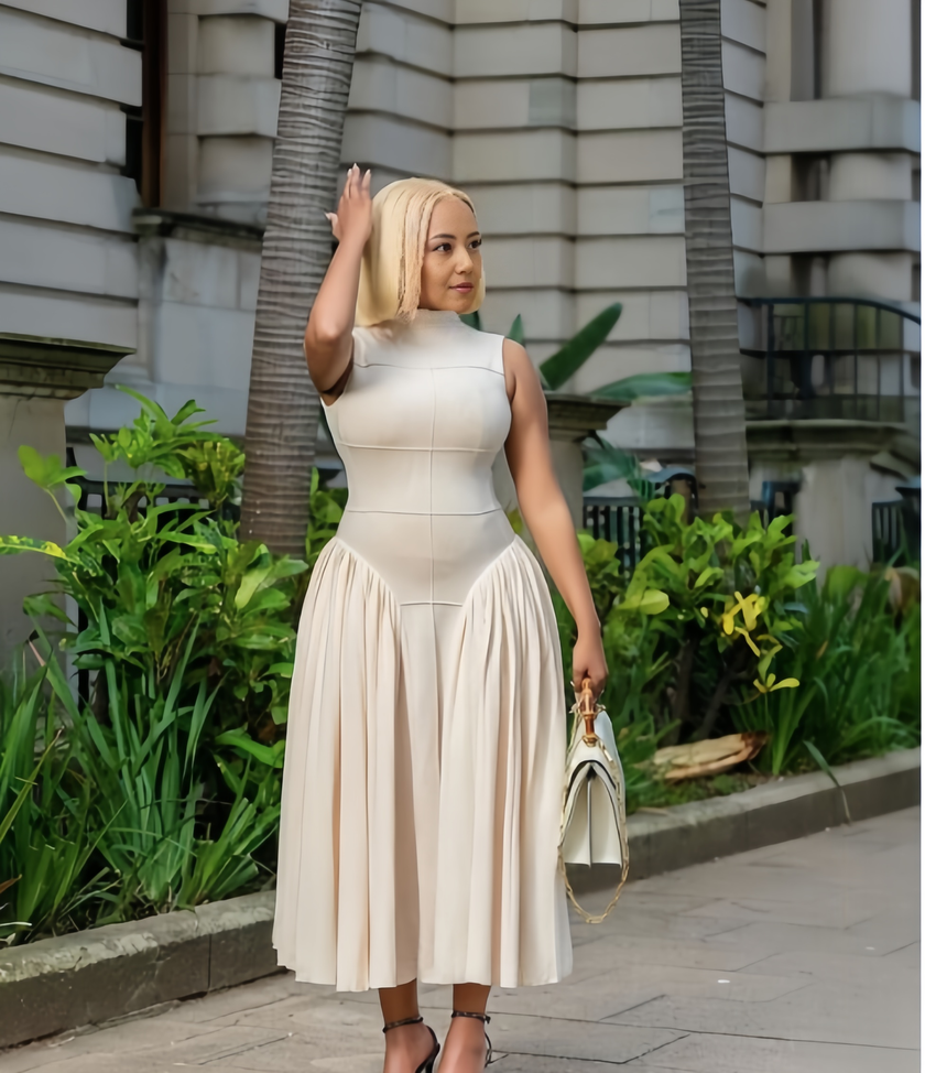 Beige A-line midi dress with defined waist, sleeveless high neck, pleated midi skirt