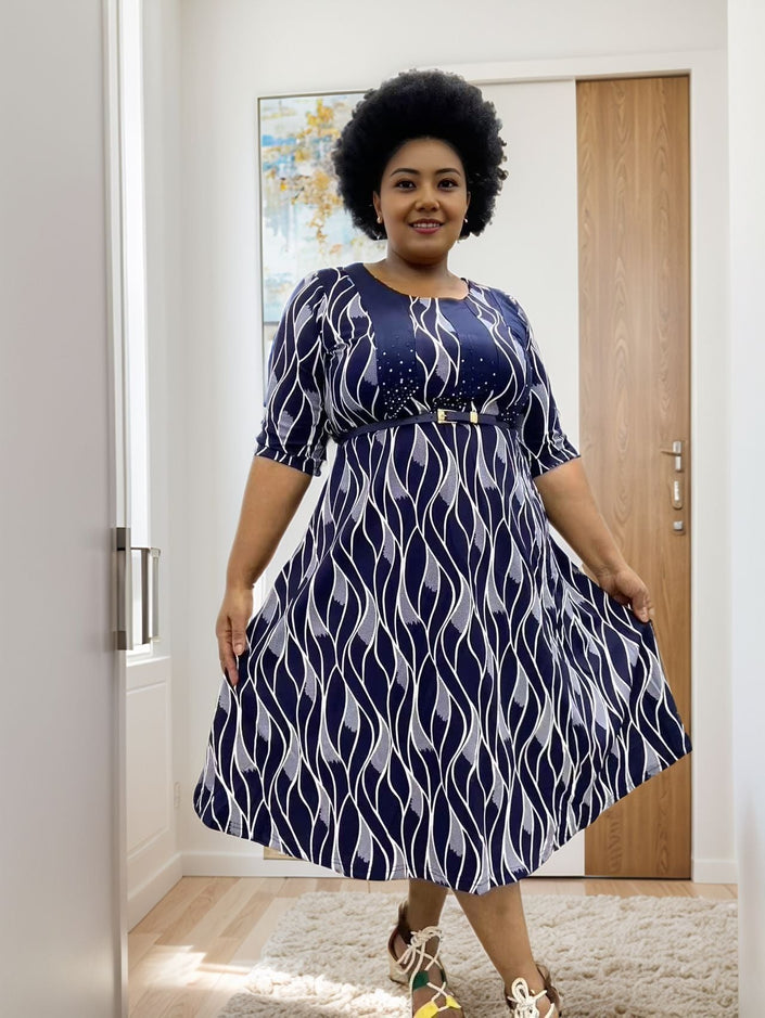 Plus size midi dress in navy-and-white geometric print with waist tie belt