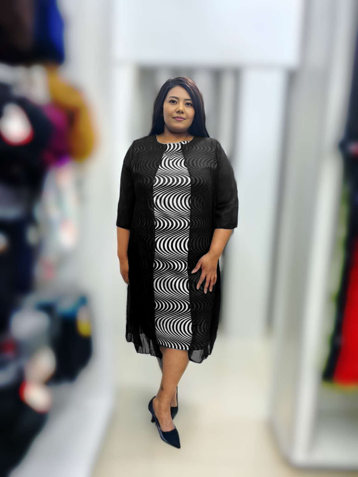 Black plus-size midi dress with swirl stripe print, 3/4 sleeves and crew neckline