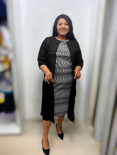 Black plus-size midi dress, wavy swirl stripe print, 3/4 sleeves, side-slit hem