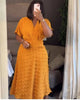 Yellow textured dot midi dress with cinched waist, V-neck, short sleeves