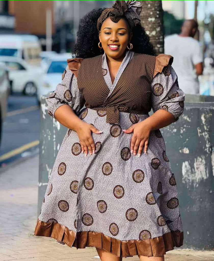 Brown and gray circle print midi dress with V-neck, tie waist, and puff sleeves