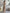 Button-Front Ribbed Knit Midi Dress with Long Sleeves and Pleated Hem Design
