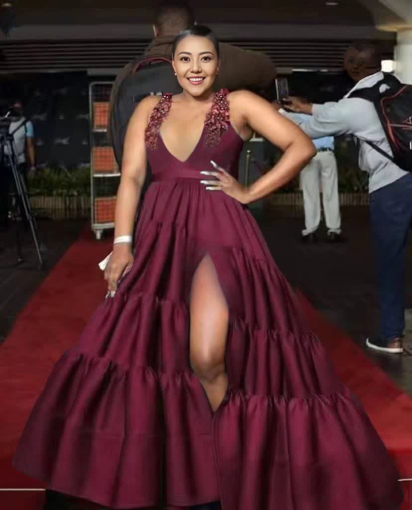 Maroon deep V evening maxi dress with embellished lace straps and high side slit.