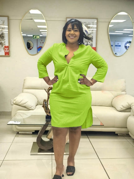 Green long-sleeve shirt dress with V-neck and button front, above-knee length