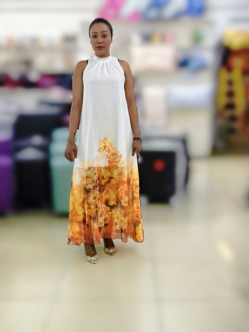 White sleeveless maxi dress with floral printed A-line skirt