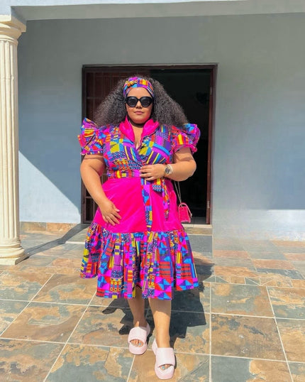 Pink and multicolor printed midi dress with puff sleeves and tiered skirt