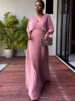 Pink pleated maxi dress with V-neck and batwing sleeves, long gathered skirt
