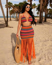 Orange geometric crochet swim cover set with triangle top, fitted skirt, and long fringe