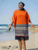 Orange fringe midi dress with wide sleeves and navy, white striped skirt hem fringe