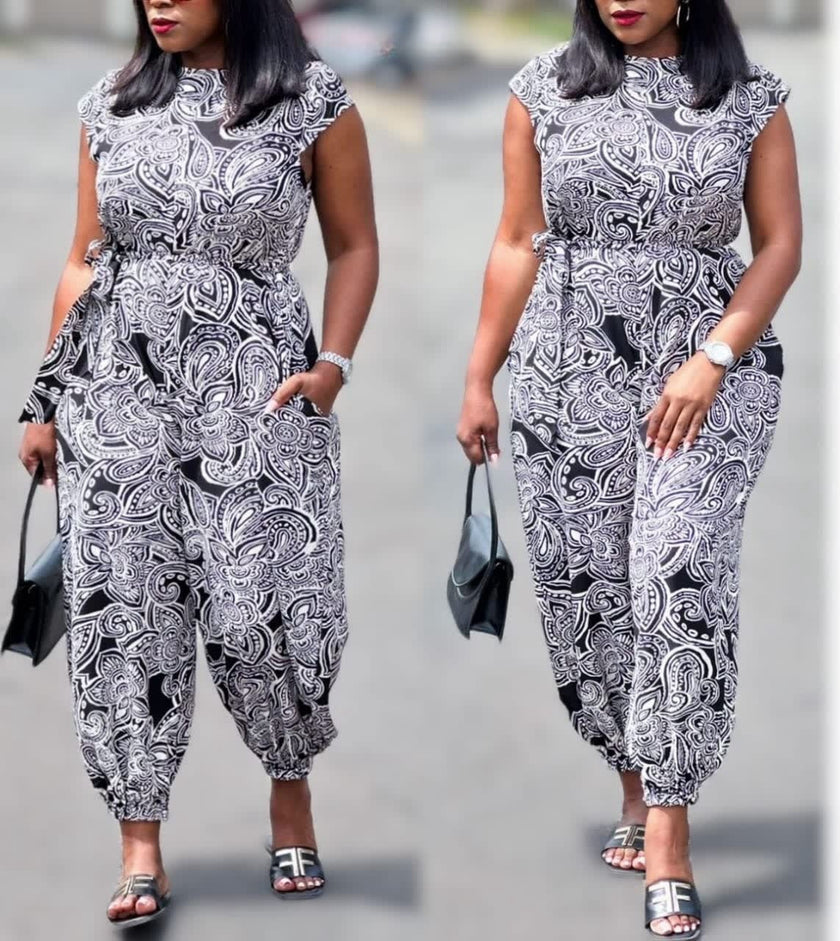 Printed paisley sleeveless jumpsuit with elastic waist and tapered ankle legs