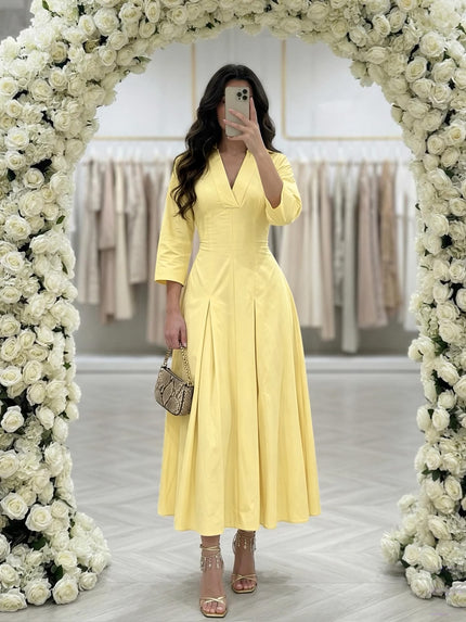 Lemon yellow collared V-neck pleated maxi shirt dress with flared skirt and half sleeves