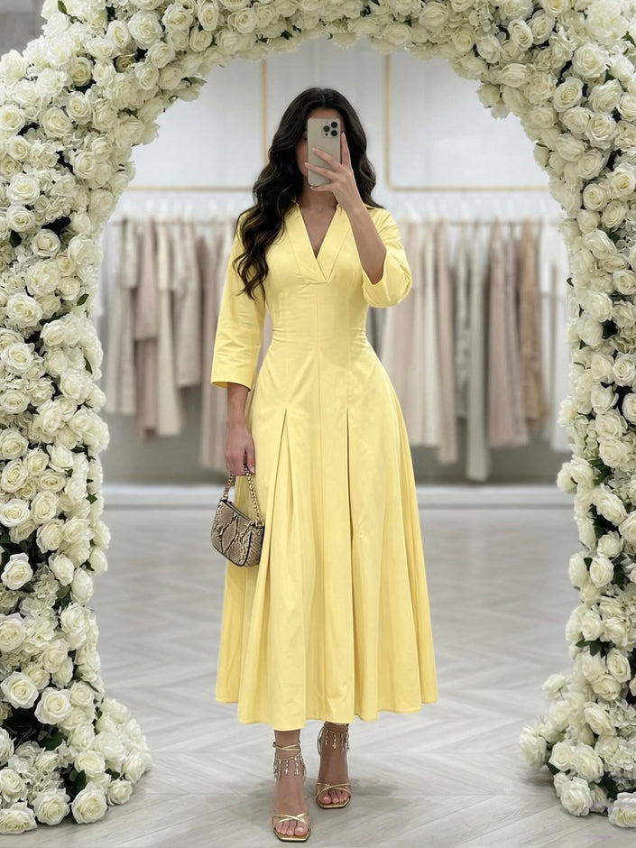 Lemon yellow collared V-neck pleated maxi shirt dress with flared skirt and half sleeves