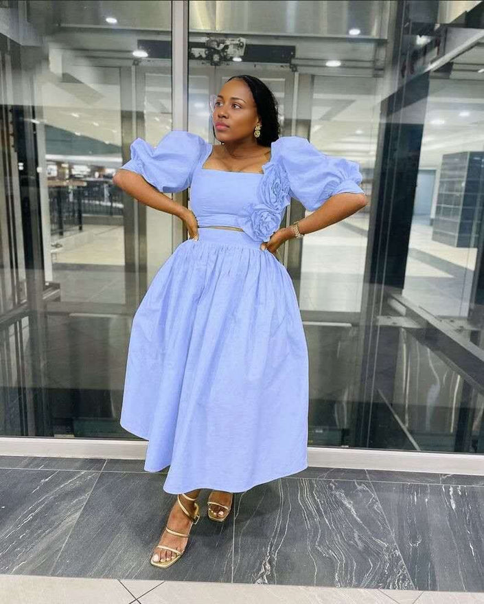 Sky-blue floral puff-sleeve midi dress with gathered waist and square neckline