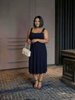 Sleeveless High-Waist Pleated Dress