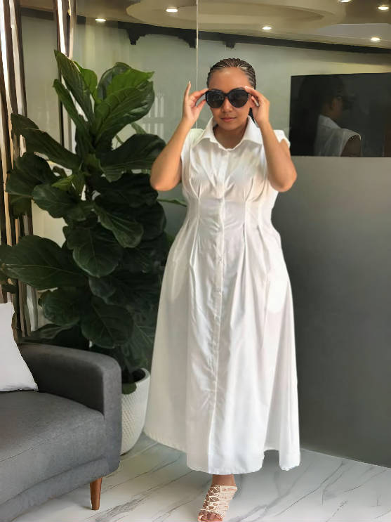 White sleeveless belted pleated midi dress with collar and center front seam