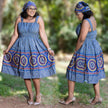 Blue sleeveless midi dress with African print, gathered skirt and round neckline