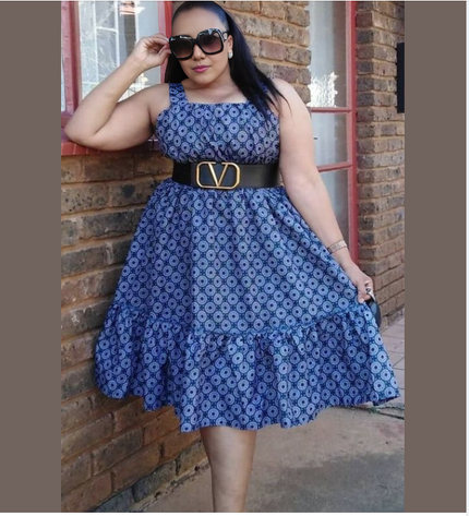 Blue printed circle dress with ruffle hem and black waist belt, sleeveless A-line