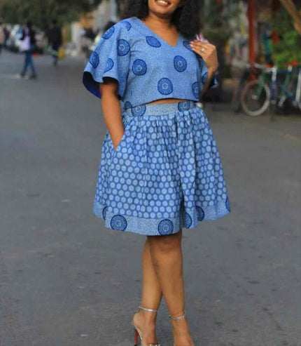 Blue patterned puff-sleeve top and pleated skirt twin set