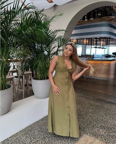 Olive sleeveless V-neck midi dress with button-down front and sleeveless fitted bodice