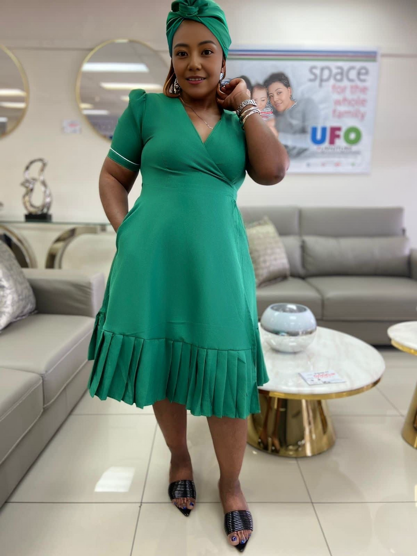 Plus size wrap midi dress in dark green, V-neck and short sleeves with ruffle hem