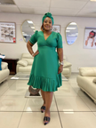 Plus size wrap midi dress in dark green with short sleeves and tiered ruffle hem