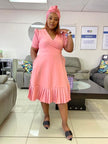 Plus size wrap midi dress in dusty pink, V-neck and short sleeves with ruffle hem
