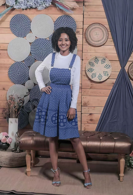 Blue plaid midi dress with adjustable straps, front tie and bib detail