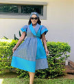 Blue geometric print puff sleeve dress with V-neck and tie belt, knee length