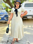A-line ribbed midi dress in light khaki with bow tie neck detail, short sleeves