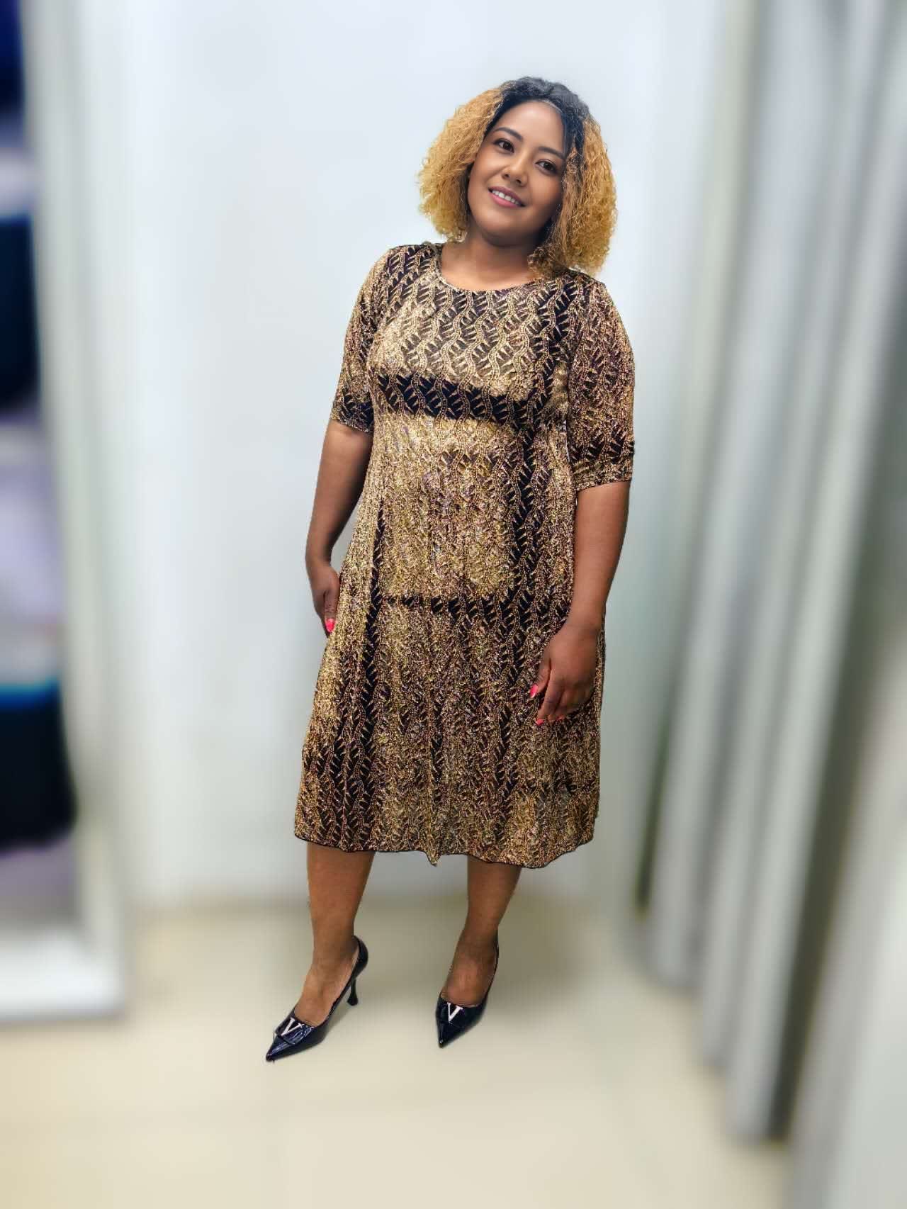 Plus size printed midi dress with short sleeves, scoop neck, brown and gold pattern