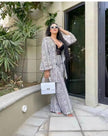 Black-and-white printed twin set: open-front top and wide-leg trousers