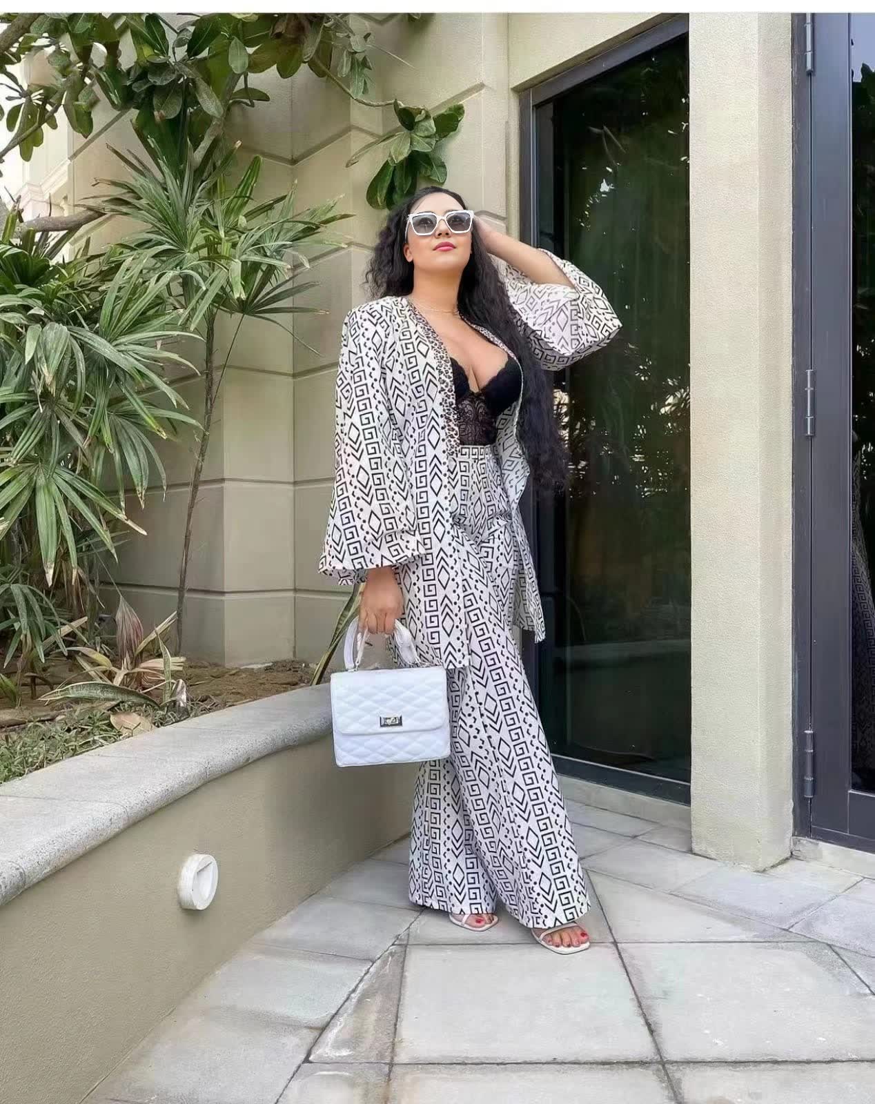Black-and-white printed twin set: open-front top and wide-leg trousers
