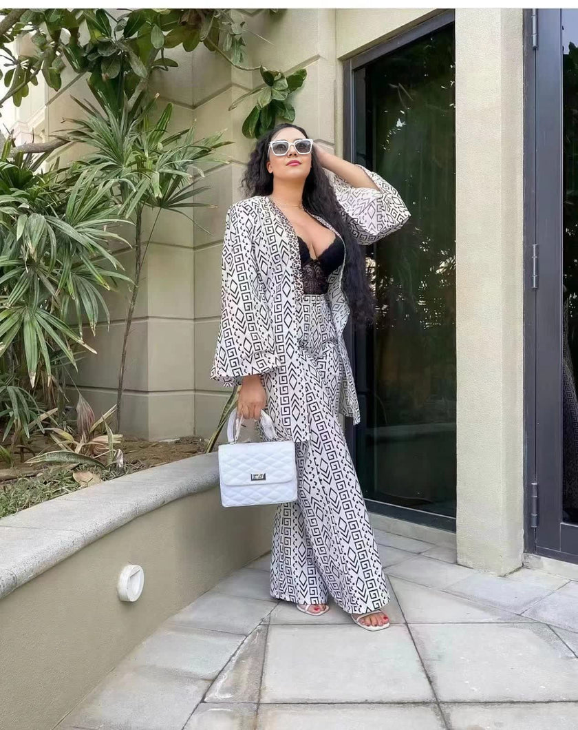 Black-and-white printed twin set: open-front top and wide-leg trousers
