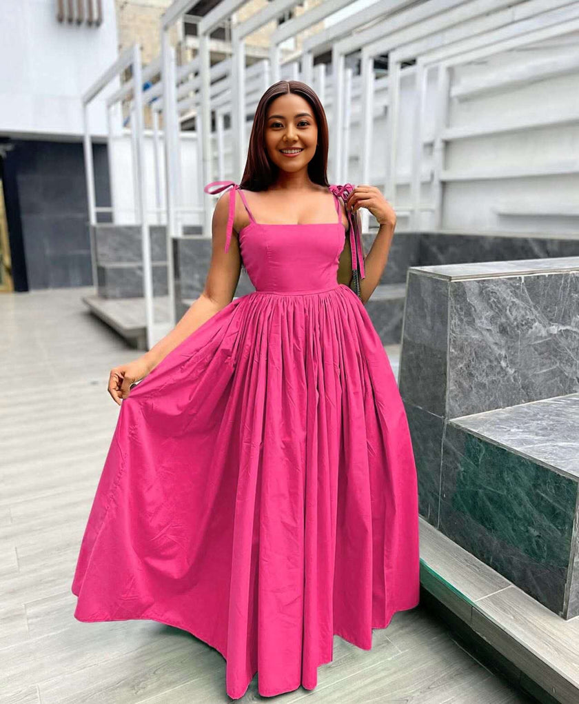 Hot-pink sleeveless square-neck maxi dress with pleated skirt and tied shoulder straps