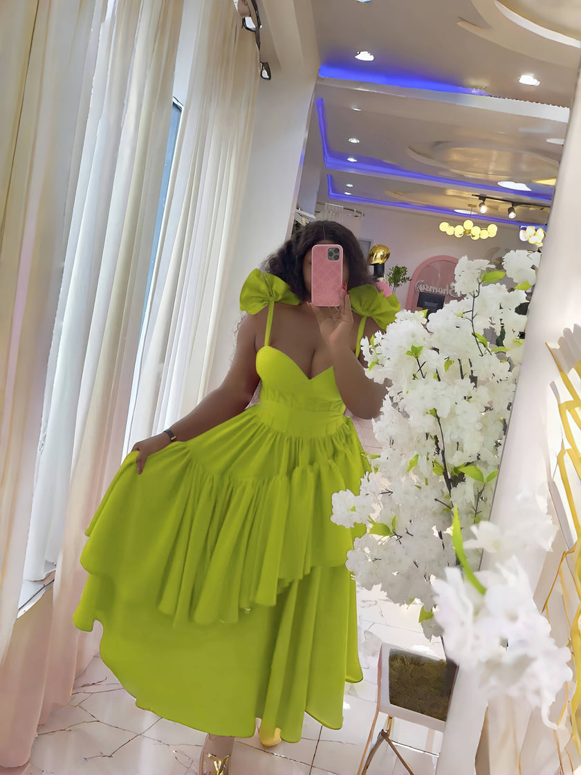 Lime green layered ruffle evening dress with puffed shoulders and fitted bodice