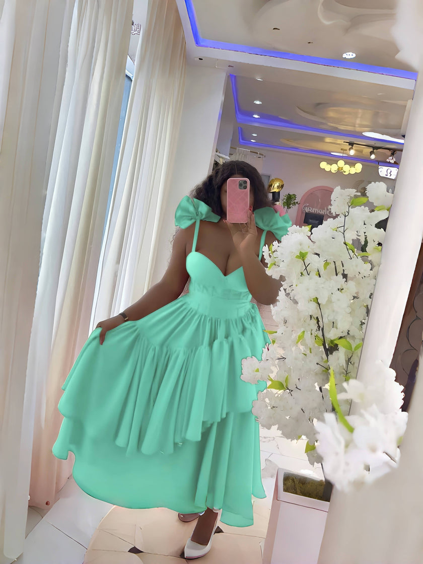 Aqua layered ruffle evening dress with puffed sleeves and fitted bodice
